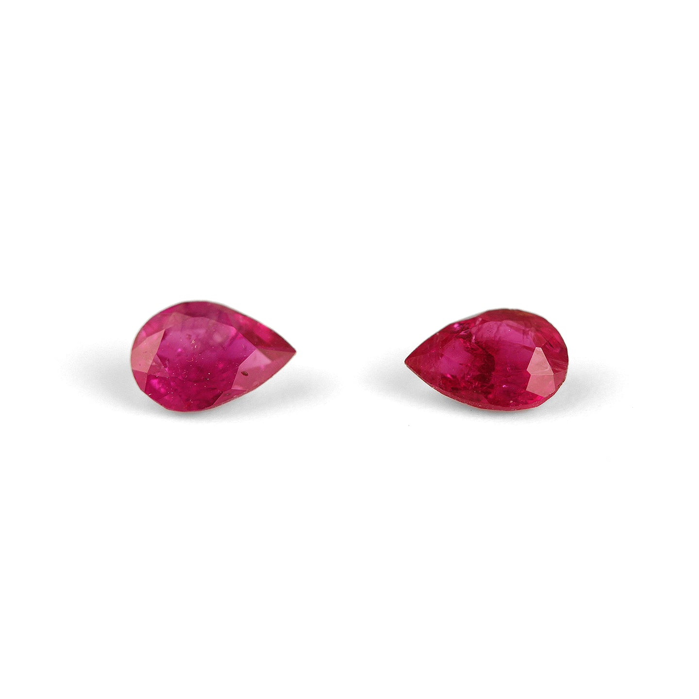 Pair of purplish red total 1 ct. Ruby in pear