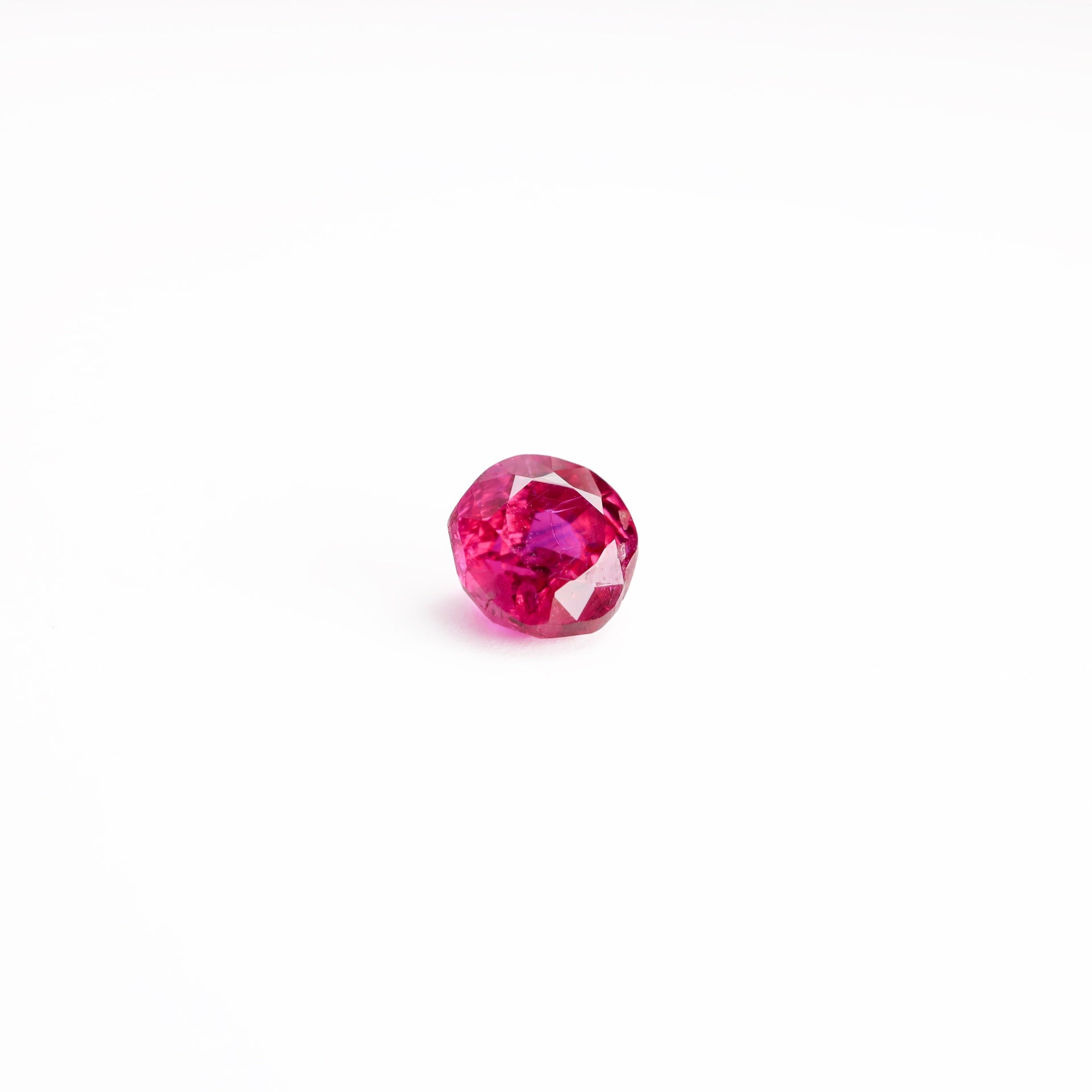 Purplish red 0.7 ct. Ruby in round