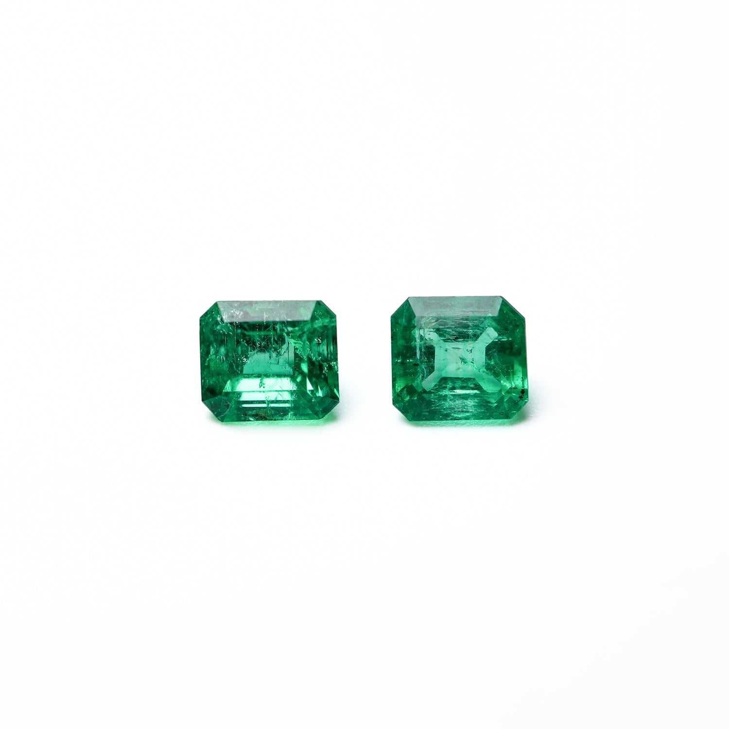 Pair of green 0.73 ct. emerald
