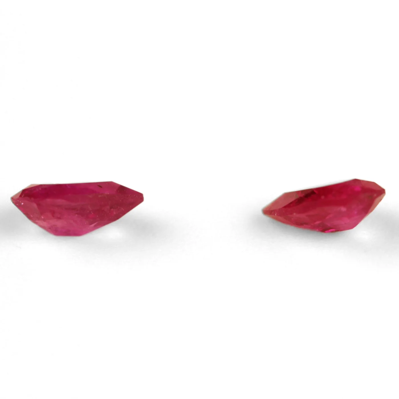 Pair of purplish red total 1 ct. Ruby in pear